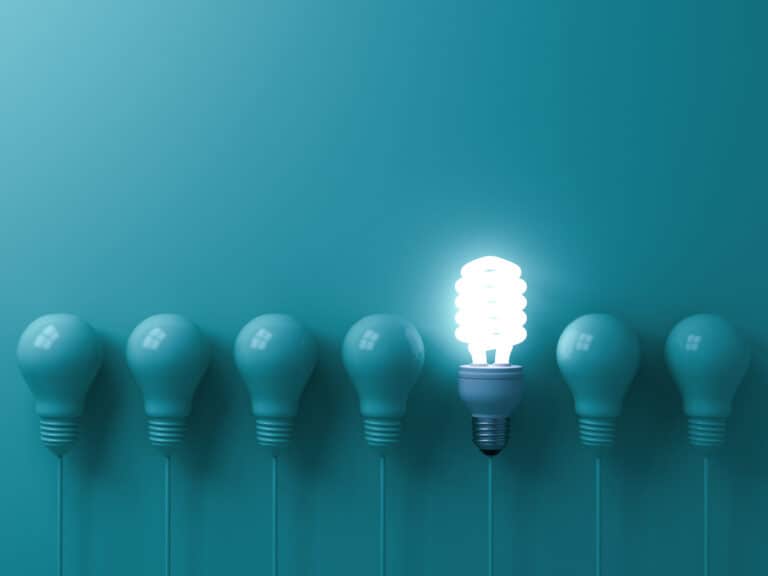 Resilient Standby Power represented with light bulbs, one hanging eco energy saving light bulb glowing.