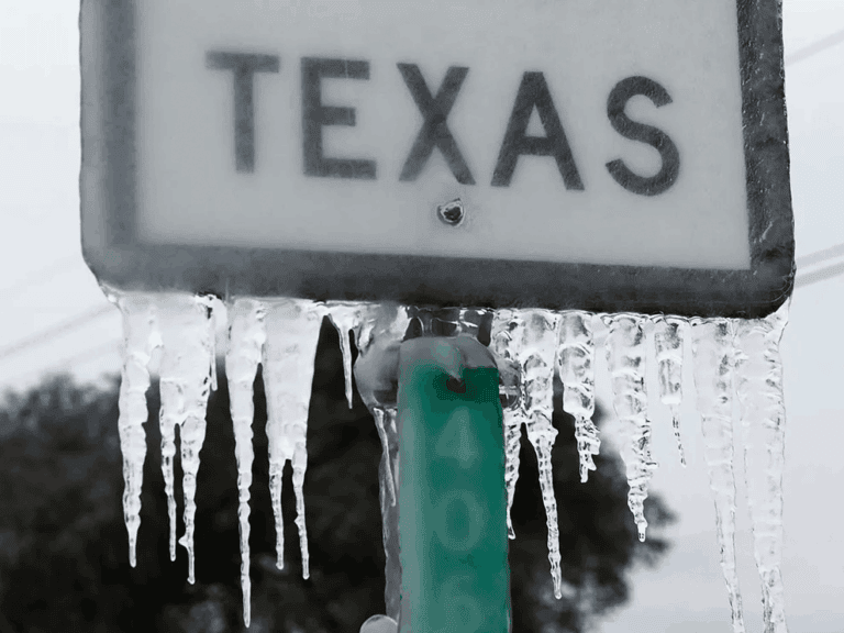 Ice on a Texas sign due to a power outage.