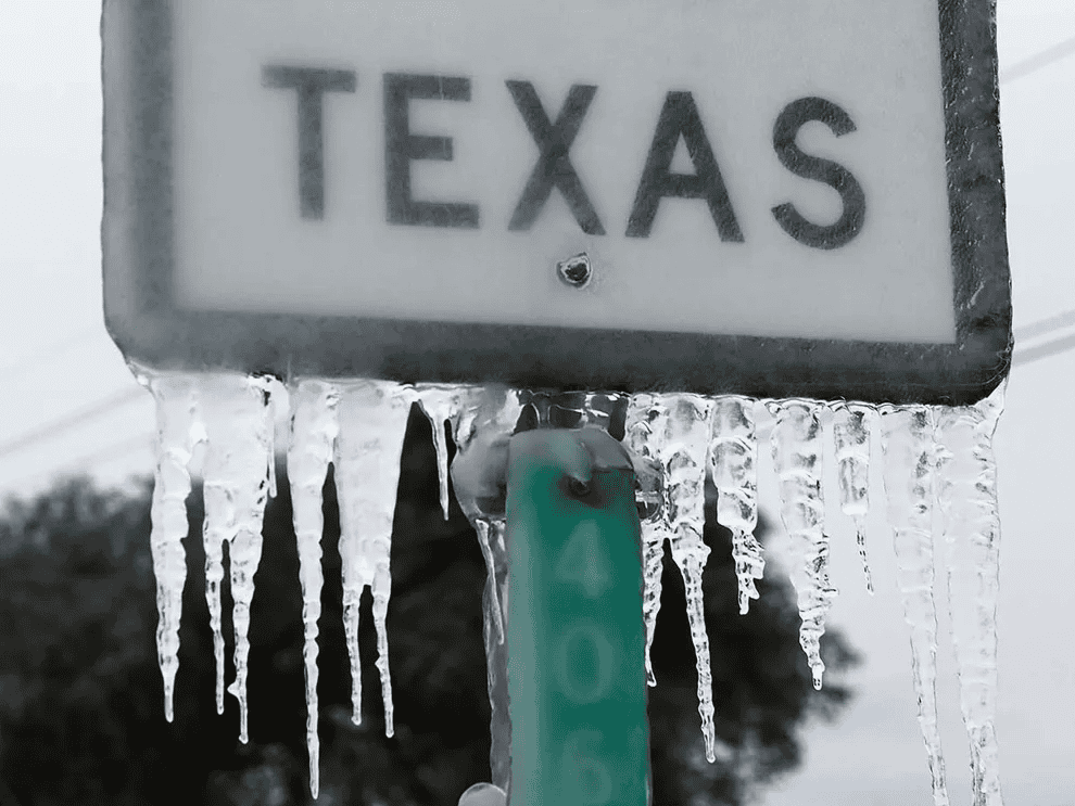 Ice on a Texas sign due to a power outage.