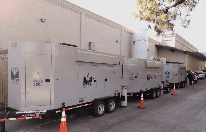 Mesa Power Solutions 350kw standby generators next to a building.