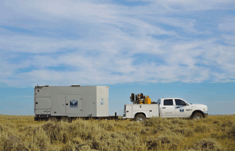 Mesa Power Solutions generator being pulled by a tech truck out to its next service location.