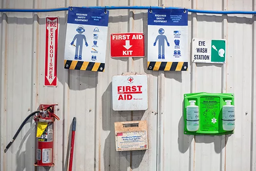 Safety Wall inside a Mesa Power Solutions shop which sets as a reminder for PPE measures.