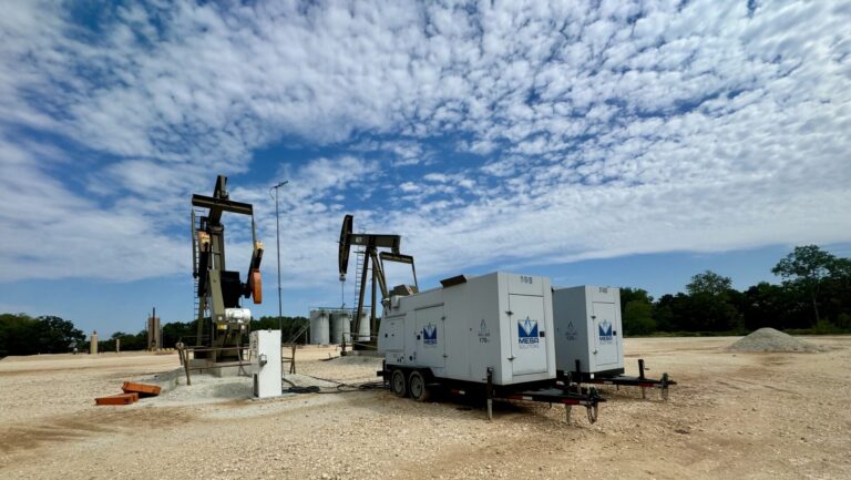 A wall decor image of oil pumps and Mesa Power Solutions 170kw generators.