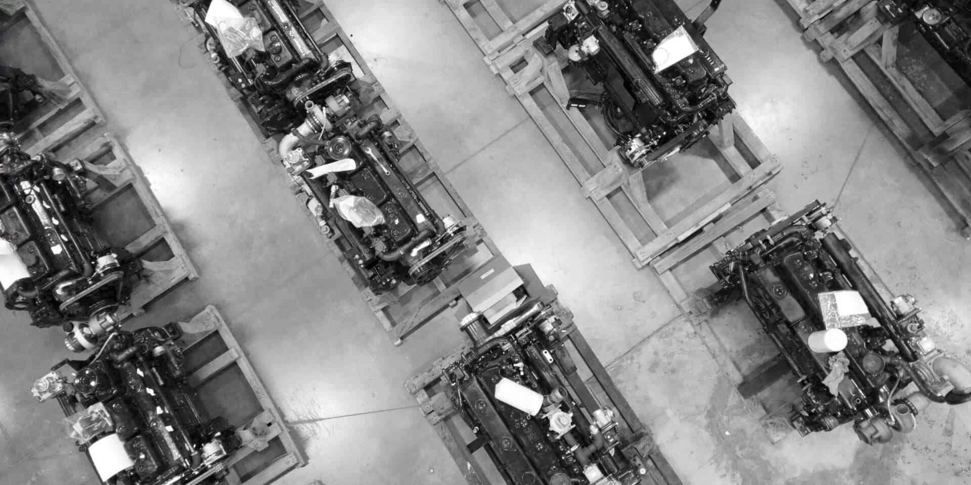 Aerial black and white image of Mesa Power Solutions engines lined up on grates.