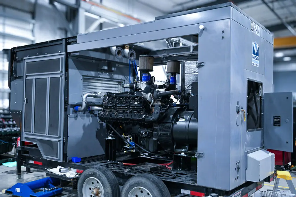 Mesa gray natural gas generator with its side panels removed to show the interior view of the engine.